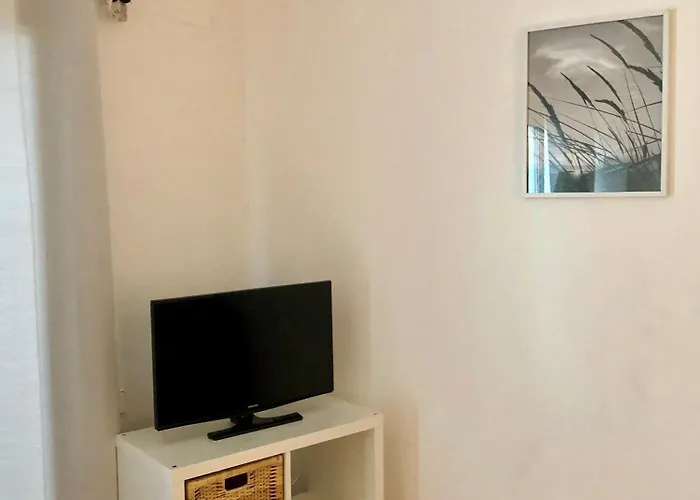 Апартаменты S'arenella